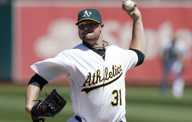 Lester pacta con Cachorros por seis temporadas y $155 millones