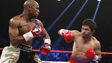 Pacquiao firma y podría pelear con Mayweather