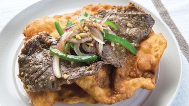 Bistec encebollado