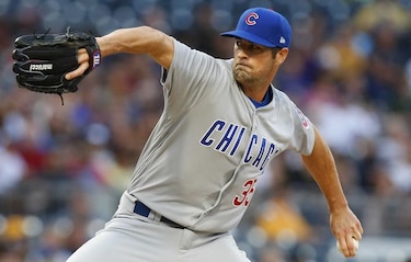 Hamels tiene un sólido debut en triunfo de los Cachorros