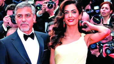 Clooney amenaza por fotos tomadas a sus mellizos