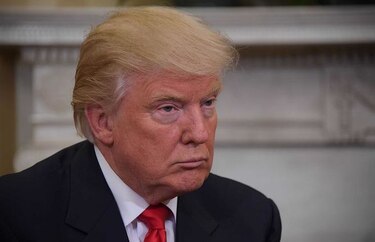 Abogados de Trump buscan negociar demanda colectiva