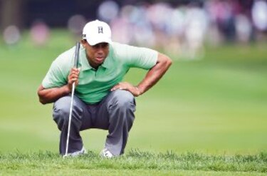 Tiger Woods termina como el mejor golfista de la campaña 2013