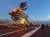 El Nimitz: lisonja y sumisión