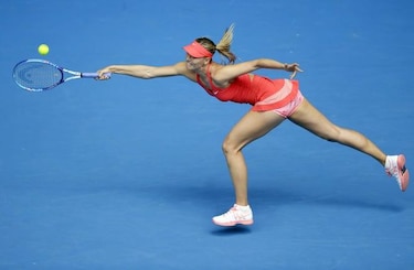 Sharapova y Nadal avanzan a cuartos de final