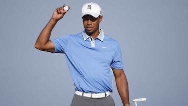 Tiger Woods  se retira con problemas de espalda