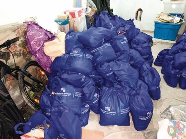Detienen a persona que  tenía en su casa cientos de bolsas de Panamá Solidario