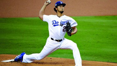 Cachorros conversan con el pícher Yu Darvish