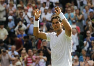 Nadal y Federer ganan en su debut en Wimbledon