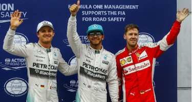 Hamilton gana la 'pole' y junto a Vettel sobreviven al diluvio