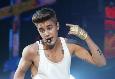 Fotógrafo que demandó a Bieber busca compensación