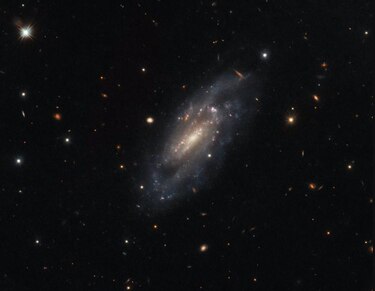 Hubble observa la imponente galaxia espiral UGC 11860