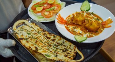 Un restaurante indio apuesta por el ‘Covid curry’ para llenar sus mesas