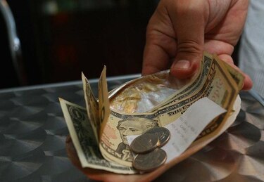 Propina voluntaria: Cuatro comercios incumplen la normativa