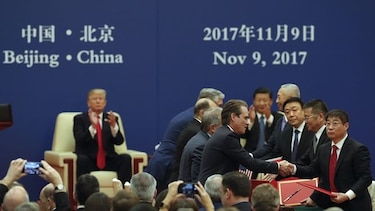 Donald Trump anuncia firma de acuerdos comerciales por unos $250 mil millones con China