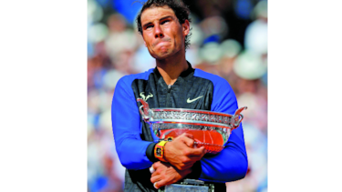 Nadal gana y hace historia