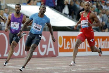 Gatlin vence a Powell y Gay en los 100 metros