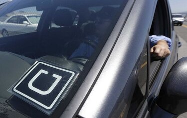 Uber mantiene a conductores como contratistas en 2 estados