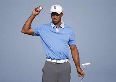 Woods se retira de dos torneos por problemas de espalda