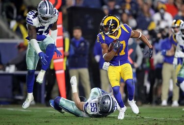 Rams superan a Cowboys y avanzan con victoria de 30-22