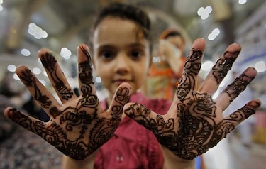 Musulmanes listos para celebrar el Eid al-Fitr