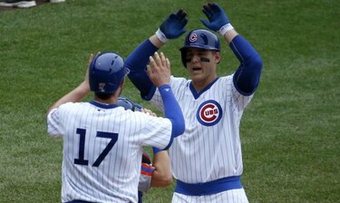 Rizzo pega dos jonrones ante Colón y Cachorros vencen a Mets