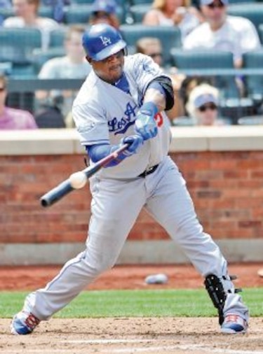 Dodgers aseguran a Juan Uribe