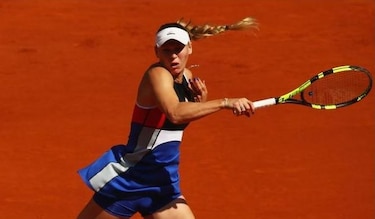 Halep, Wozniacki y Puig avanzan a segunda ronda