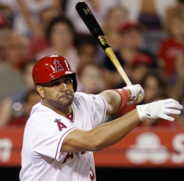 De la Rosa y Vólquez brillan desde el montículo; Pujols y Cruz ponen el bate