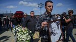 Miles de personas homenajean en Bielorrusia al periodista Pavel Sheremet