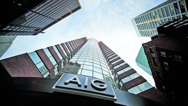 AIG recorta personal y vende divisiones