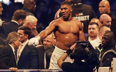 Joshua intenta convertirse en campeón absoluto de los pesos pesados