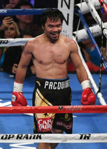 Pacquiao derrota a Vargas y reclama título welter de la OMB