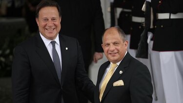 Presidente de Costa Rica defiende gira por Europa; dice que no se va de vacaciones