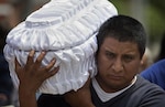 Elevan a 85 los muertos en Guatemala y suspenden la búsqueda
