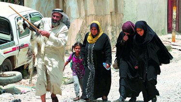 Refugiados huyen con miedo de Mosul