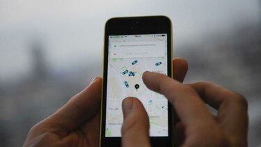 Uber hace equipo con GM y entra a negocio de autos compartidos