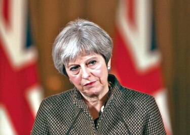 May promete que mantendrá una relación comercial abierta con la Unión Europea